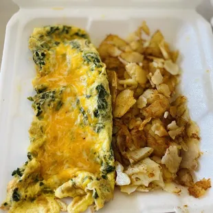 Spinach cheesy omelette with home fries