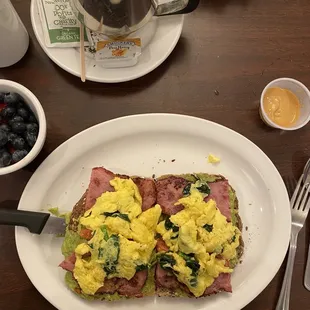 Scrambled avocado toast with turkey bacon