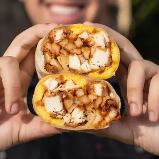 ENB Burrito made with chopped Fried Chicken, Scrambled Eggs, Fries, and Crack Sauce wrapped in a Cheese Crusted Tortilla.