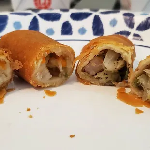 Veggie egg roll (left), shrimp egg roll (right)
