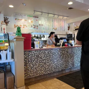 Huge menu board. Both Chinese and Vietnamese food