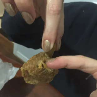 We reviewed multiple wings that did not even look like chicken at all and had feathers all over them. So gross