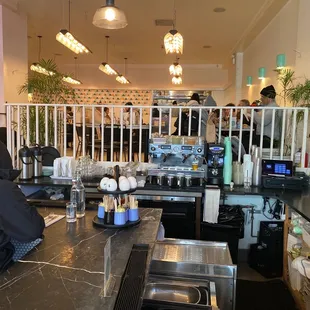 Bar seating or tables up the stairs