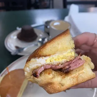 Brioche egg &amp; turkey bacon with Swiss cheese sandwich &amp; a side of fruit &amp; a banana nut muffin