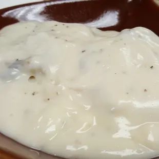  a close up of a bowl of eggberts