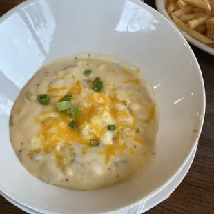 Original half, only, full bowl of soup, which was expensive and dirty, crusted food from somebody else at the right.
