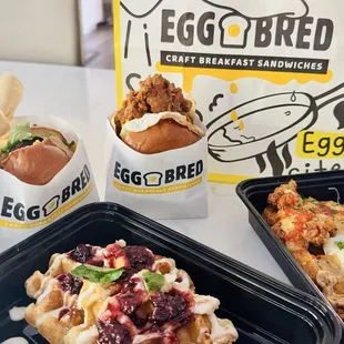 Truffle burger, country fried chicken sandwich, mixed berry waffles, poutine