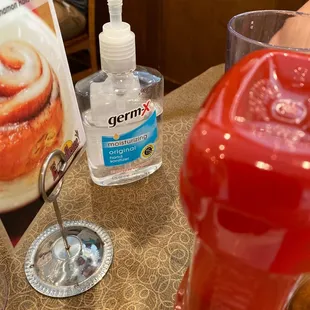 Hand sanitizer on every table