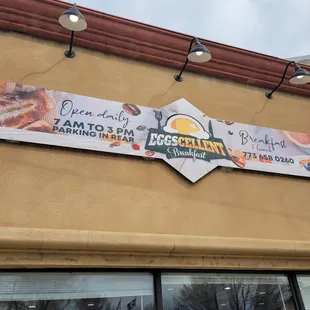 a sign on the outside of a restaurant