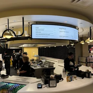 a view of a busy restaurant counter