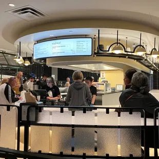 a crowd of people in a restaurant