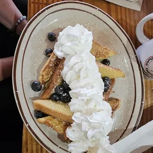 two plates of breakfast food