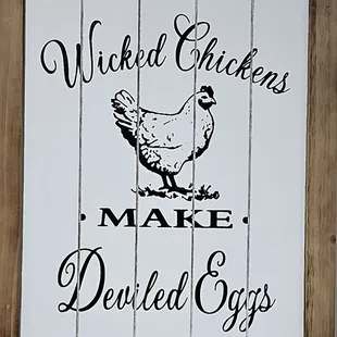 a chicken on a sign