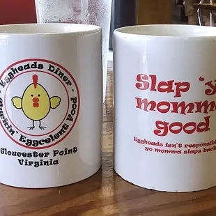 two coffee mugs on a table
