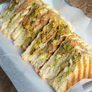 a sandwich on a piece of wax paper