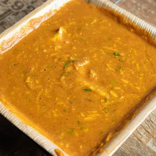 a close up of a bowl of soup