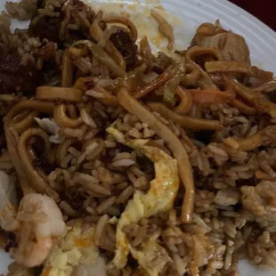 a plate of rice and meat