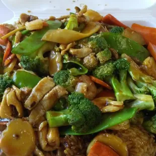 China town is a must  has veggies chicken and shrimp with rice.