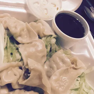 Steamed Dumplings. Meh. Gyoza sauce was bland. The bed of shredded lettuce was soggy.