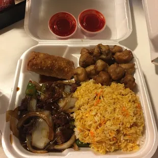 D2 pepper steak, rice, egg roll and sweet and sour pork, sauce on the side