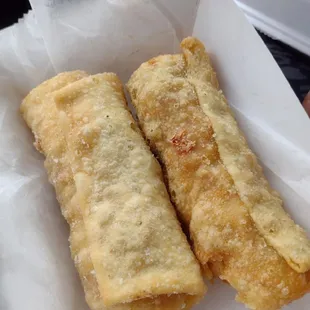 a close up of two pieces of bread