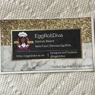 Her business card her husband was handing out to those who were waiting in line
