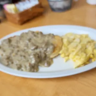 Sausage gravy and biscuits with 2 eggs