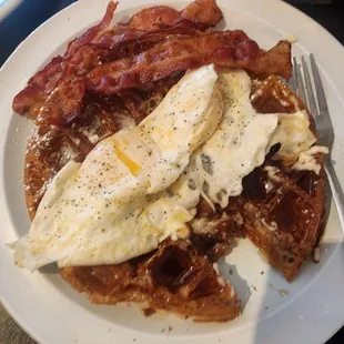 Waffle, two eggs over easy and bacon