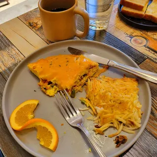 1/2 of a Denver Omelet! The eggs and more Omelet started out with four eggs. Great for sharing.