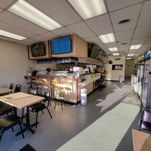 Restaurant. Love the light spilling in! Very clean and inviting.