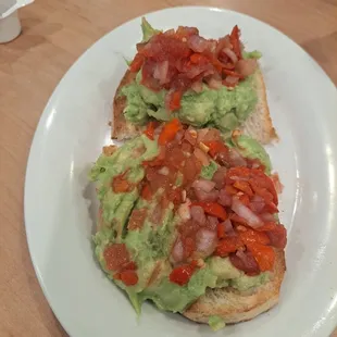 Avocado toast with salsa. Perfectly crippling toast and the flavor is amazing!!!