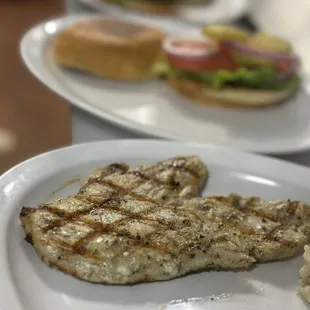 grilled chicken on a white plate