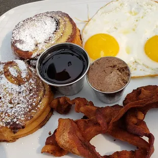 Cinna-bomb french toast combo ($15) comes with 2 eggs, choice of meat, and AMAZING cinnamon butter