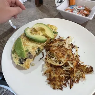 Veggie Omelette with side of Avocado and hash brown