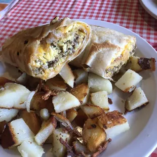 Sausage egg and cheese wrap with home fries