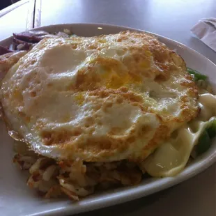 Corn beef skillet w/fried eggs over hard!