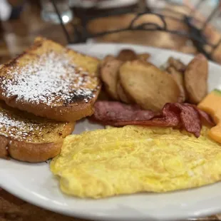 French toast, eggs (omelette) Turkey bacon, potato