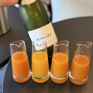 I just found out that they serve mimosas and it's very tasty! I don't think they use a store bought juice, juice itself is very tasty!