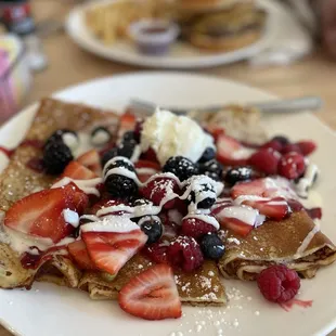 Very Berry on your choice of pancakes, crepes (pictured), waffles, and more. So good!