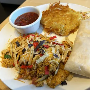 Migas, hash brown and side of flour tortillas