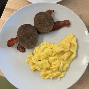 Soft scrambled eggs, sausage, bacon