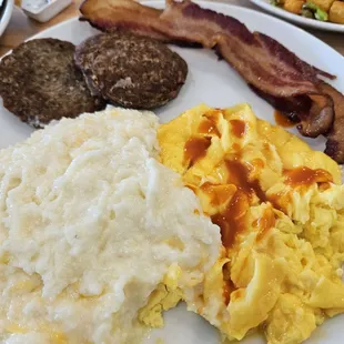 I added Cholula to my eggs, next is grits sausage and the best bacon I've had in a while!.