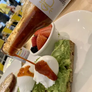 Avocado toast topped with homemade hotsauce