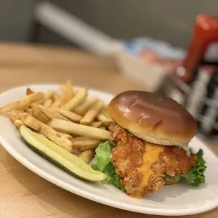 Buffalo chicken sandwich -  piled high with swiss cheese, lettuce, tomato and a special sauce.