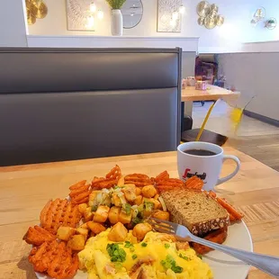 Salmon Scrambler w/ Potatoes Obrien! Always a great meal here at Eggsquisite Rockwall.