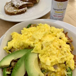 Now open for breakfast and lunch - Our one of a kind chicken carnitas skillet - with corn, jalapeños, tomatoes, and fresh avocado!
