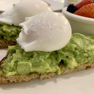 Yup - simple, fresh and delicious.  Avocado toast, sea salt, EVOO, fresh lemon w homemade hot sauce too.  Whole grain toast and 2 eggs.