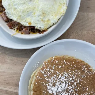 My hubby's skillet breakfast with a side of very fluffy yummy pancakes, best we have had in a long time.