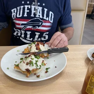 Chicken benny. Chicken fried chicken on a biscuit and gravy topped with poached eggs