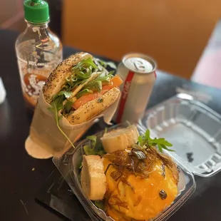 a sandwich and a drink on a table